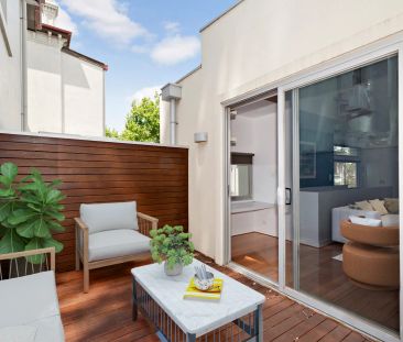 Modern Two-Bedroom Townhouse with Balcony and Secure Garage - Photo 4