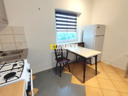 Przestronna kawalerka, osobna kuchnia - Zdjęcie 4