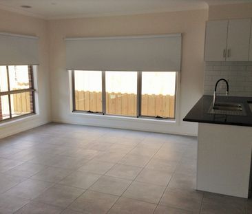 AS NEW THREE BEDROOM HOME - Photo 6