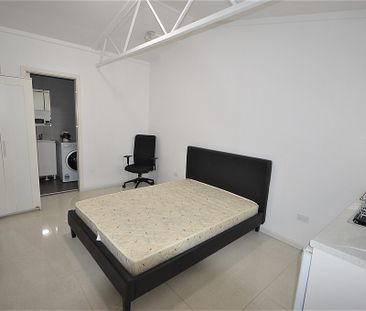 All-Inclusive Studio Apartment: Furnished, Tiled, and Conveniently ... - Photo 1