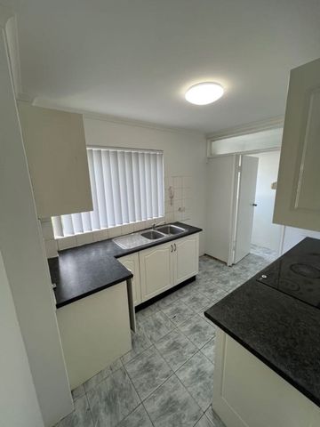 Fresh & Convenient 2-Bedroom Unit with Lock-Up Garage - Photo 5