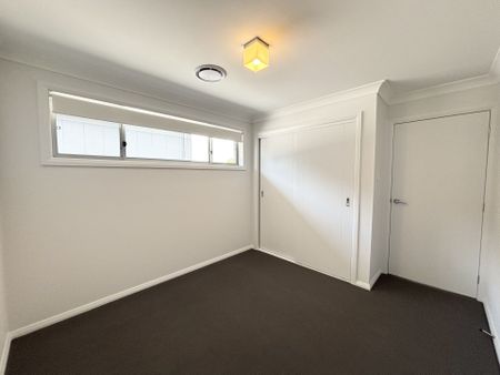 Stylish Three - Bedroom Home in Premier Gregory Hills Location - Photo 2