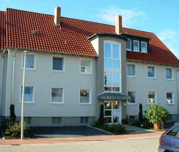 Schöne Dachgeschoss-Wohnung in Hattorf! - Foto 1