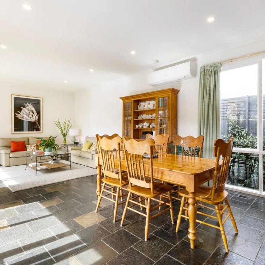 CHARMING VICTORIAN-INSPIRED HOME IN A BRIGHT, LOW MAINTENANCE GARDEN SETTING! - Photo 1