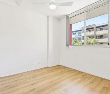 Modern & Fresh: Renovated 2-Bed Unit with Brand New Floating Floors - Photo 1