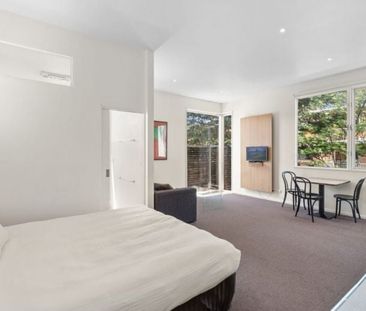 Fully Furnished Studio Apartment - Photo 1