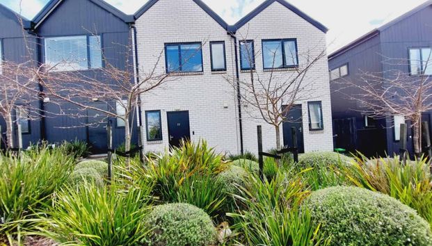 Stylish 2-Bedroom Home with Modern Comforts & Private Outdoor Spaces - Photo 1