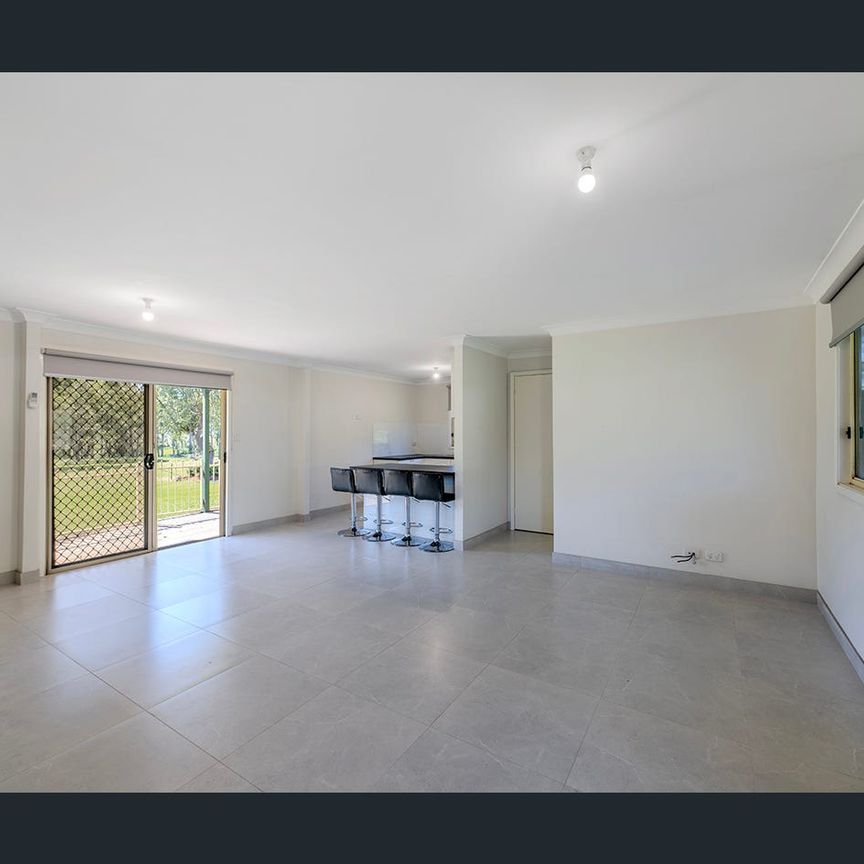 Serene Rural Granny Flat with Large Yard - Photo 1