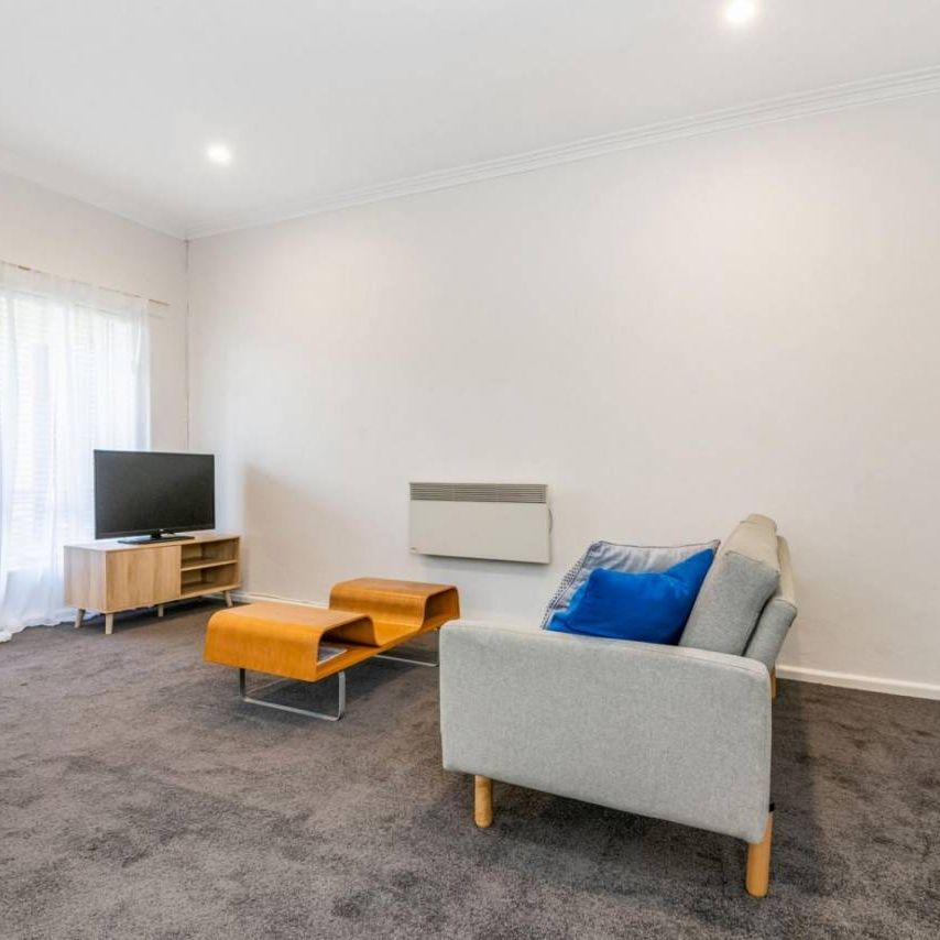 NEAT UNIT IN A GREAT LOCATION! - Photo 1