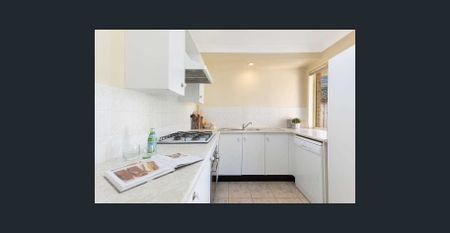 Charming Solid Brick Family Home in Sought-After Location - Photo 2