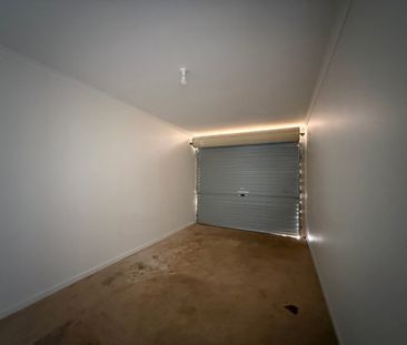 Modern 3-Bedroom Home with Open Living and Private Backyard - Photo 6