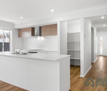 Spacious 4-Bedroom Family Home with Modern Comforts - Photo 6