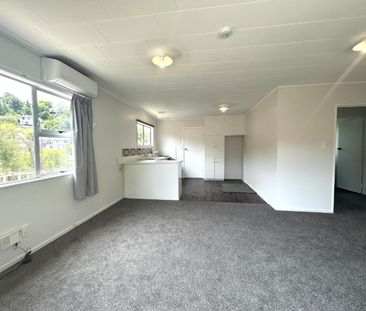 Freshly Updated 2 Bedroom Home Close to Schools and City - Ready Soon! - Photo 1