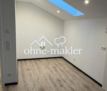 Außergewöhnlich große 2-Zimmer-Dachgeschosswohnung mit Dachterrasse - Photo 1