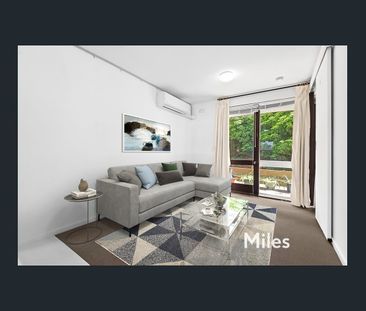 QUIET GROUND FLOOR LIVING, CONVENIENT LIFESTYLE LOCATION - Photo 1