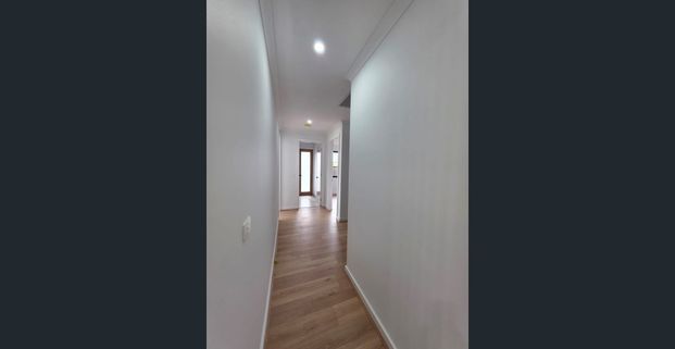 Corner-Block Comfort with Serene Creek Views - Photo 1