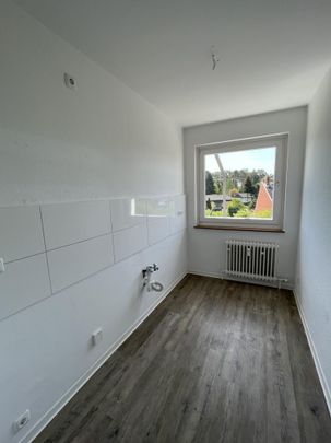 Gemütliche 3-Zimmer-Erdgeschosswohnung in Hambühren mit modernem Bodenbelag! - Photo 1