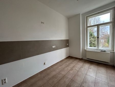 großzügige Altbau-Wohnung mit Kamin und Echtholzdielen - Photo 4