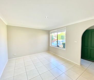 4 Arnold Avenue, Green Valley, NSW 2168 - Photo 2