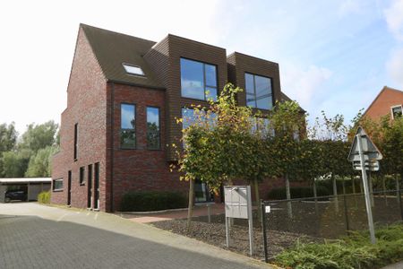 Ruime duplex met 2 slaapkamers, terras en carport. - Foto 2