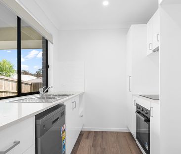 Modern Family Home in Logan Reserve - Photo 1