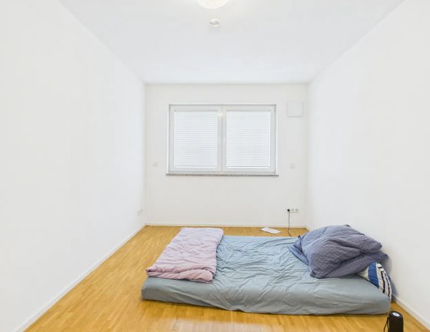 Moderne 2-Zimmer-Erdgeschosswohnung inklusive Einbauküche, Tiefgaragenstellplatz und Gartenanteil! - Photo 1