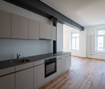 Stilvolle 2.5 Zimmer-Wohnung mit Altbaucharme - Foto 4