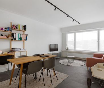 Gelijkvloers appartement met terras en tuin. - Foto 1