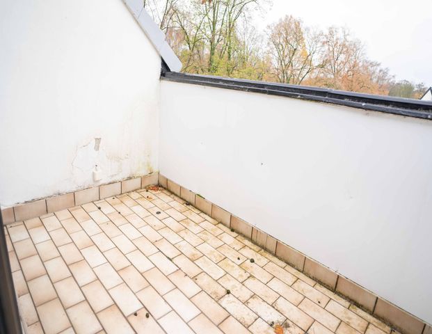 Direkt am Schmölderpark: Schickes DG-Appartement mit Einbauküche! - Photo 1