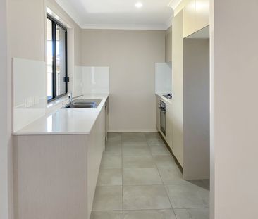 Modern Family Living in the Heart of Cliftleigh - Photo 4