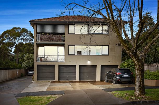 Spacious and sun-soaked with an enviable address - Photo 1