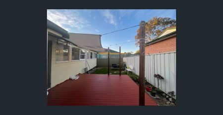 Four Bedroom Two Bathroom One Carport Coming Out! - Photo 3
