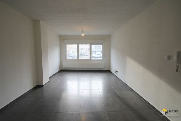 Instapklaar appartement van ca. 65 m² met 2 slaapkamers en grote koer gelegen op het gelijkvloers in een kleinschalig gebouw. - Photo 1