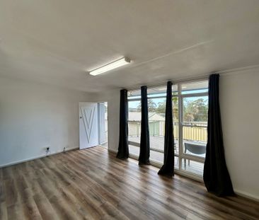 FRESHLY UPDATED HOME IN A FAMILY-FRIENDLY LOCATION - Photo 6