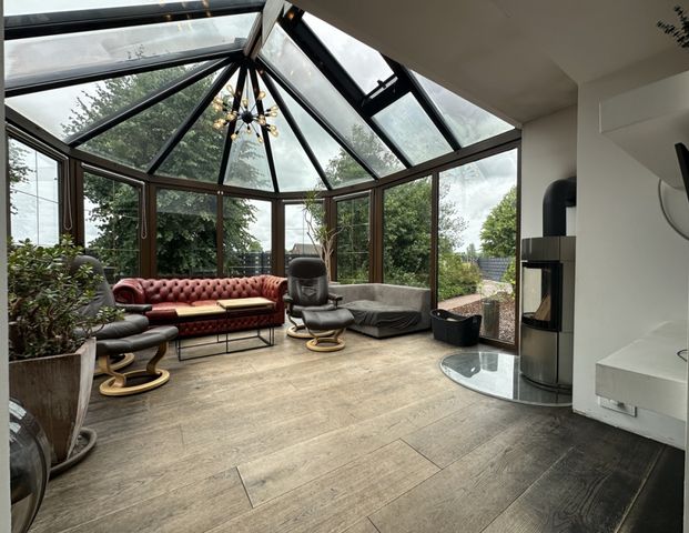 Großzügige Wohnung mit pflegeleichtem Garten - Foto 1