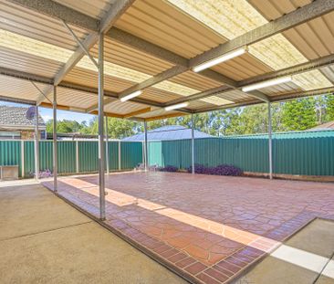 Spacious 4-Bedroom Family Home with a Spacious Sunroom & Large Outd... - Photo 5