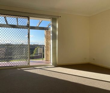 Renovated 3 Bedroom Townhouse with Scenic District Views - Photo 3
