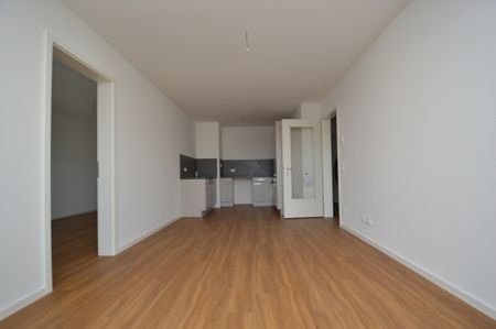 KOMFORTABEL WOHNEN FÜR SINGLE ODER PAAR - KLEINE 3-ZIMMER-WHG. MIT AUFZUG, BALKON, FUSSBODENHEIZUNG UND EINBAUKÜCHE - Photo 2