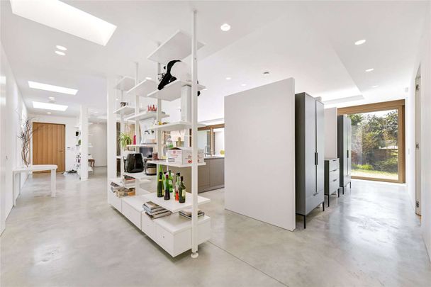 A fantastic, contemporary four bedroom home located on the prestigious West Hill Road. - Photo 1