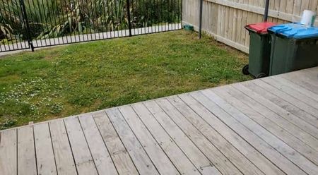 Spacious 2-Storey Unit with Private Yard and Deck - Photo 4