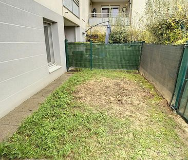 Décines : Beau T2 en rez-de-jardin avec terrasse et garage - Photo 1