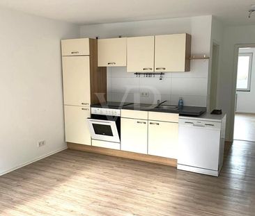 Gepflegte 2-Zimmer-Wohnung mit Einbauküche in zentraler Lage - Foto 6