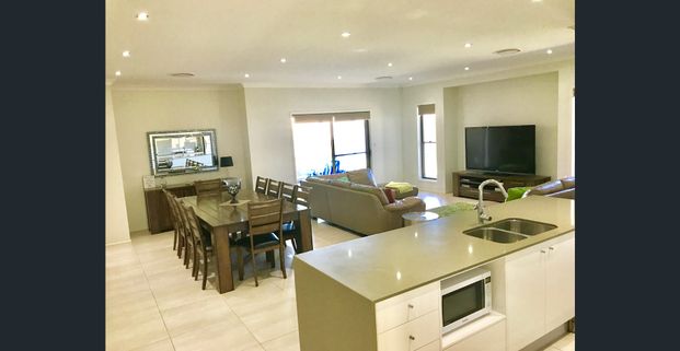 COASTAL EXCELLENCE IN BAYSWOOD- Fully Furnished - Photo 1