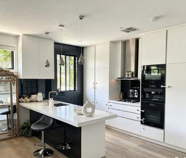 Renovated 3-Bedroom House with Spacious Living & Outdoor Entertaining - Photo 5