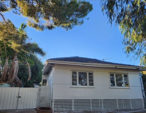 Renovated 3-Bedroom Home with Huge Patio & Sheds – Ready to Move In! - Photo 1