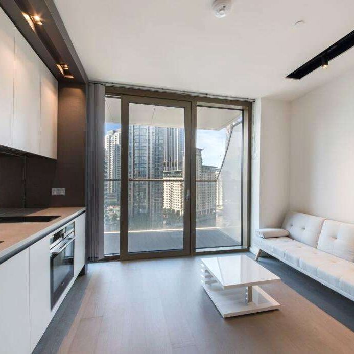 The studio apartment itself boasts an open-plan layout, providing a seamless flow between the living, dining, and sleeping areas. - Photo 1