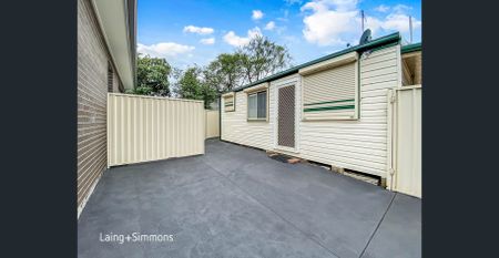 Cozy, Convenient Living with Near-New Two Bedroom Retreat! - Photo 4