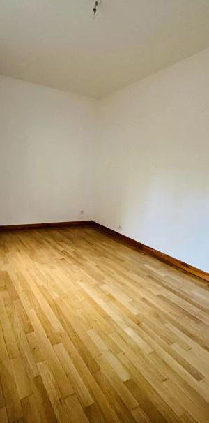 A LOUER APPARTEMENT EN RDC PROCHE CENTRE VILLE DE ST QUENTIN 02100 - Photo 1