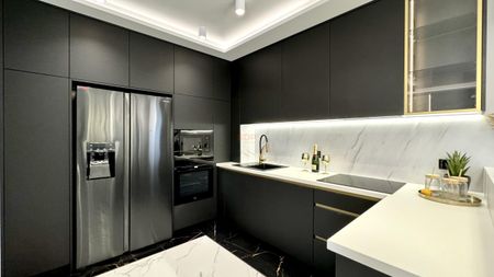 Eleganckie mieszkanie z tarasem - Zdjęcie 3