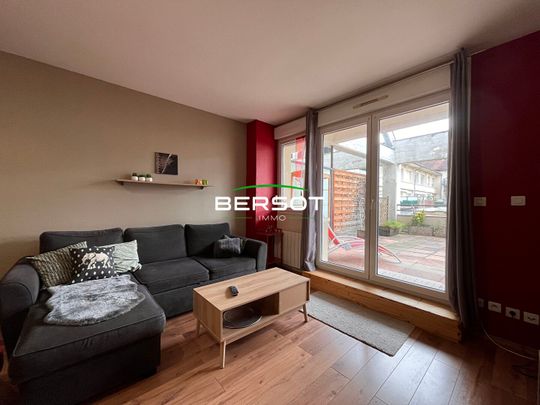 Appartement T2 bis meublé avec terrasse et place de parking - Photo 1